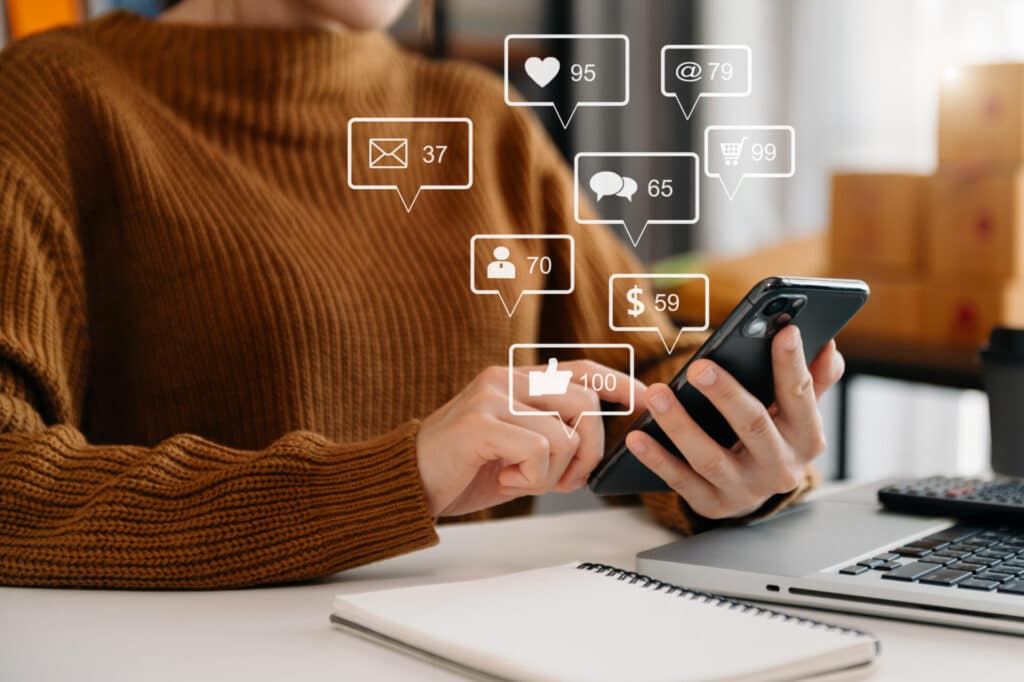 social media marketing virtual icons screen conceptclose up businesswoman typing keyboard tablet with laptop computer smart phone